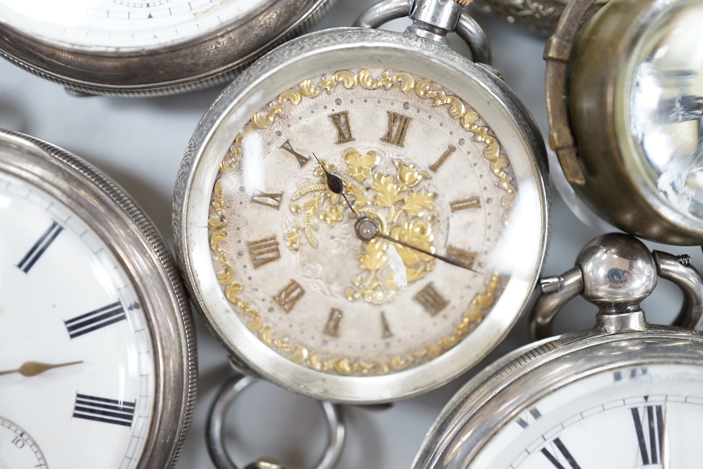 Thirteen assorted pocket and fob watches including silver Exchange and silver J.W. Benson.